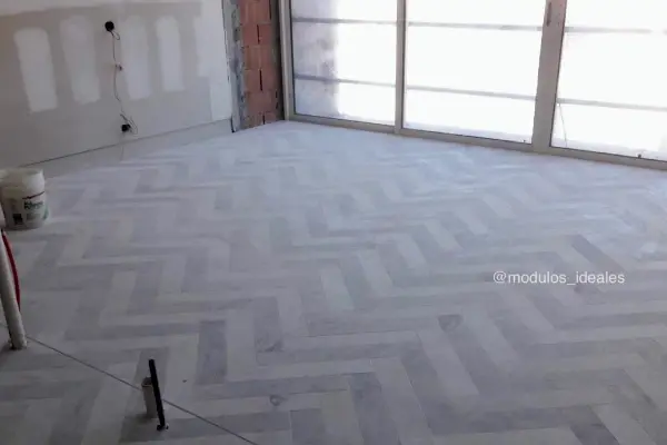 Instalación de piso de marmol diseño espina de pescado